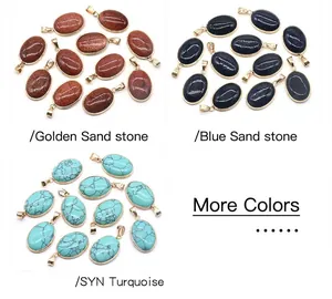 Detail view of oval natural gemstone pendants in gold sand and blue sand stones