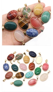 Detailed close-up of oval natural stone pendants with gold-plated edges in various colors
