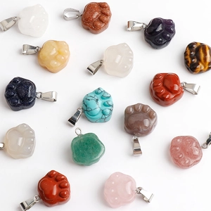 Assorted natural stone paw pendants in amethyst and tiger eye with silver bails