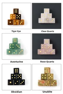 Assortment of six types of polished natural gemstone D6 dice sets with gold dots