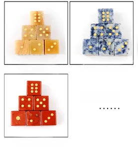 Natural gemstone D6 dice set featuring yellow jade, blue spot, and red jasper with gold pips