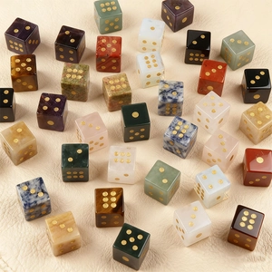 Polished natural gemstone dice set with gold numbers featuring amethyst and tiger eye