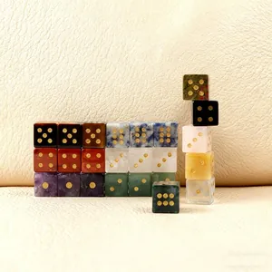 Detailed grid of natural gemstone D6 dice featuring tiger eye and amethyst with gold numbers