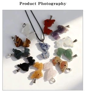 Detailed collection of assorted colorful natural stone animal pendants with silver clasps