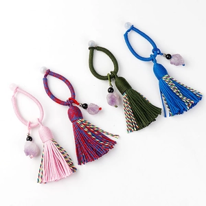 Set di quattro nappine boho fatte a mano con pietre di ametista viola e frange colorate