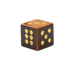 Single natural tiger eye stone dice with golden engraved numbers for games or decor