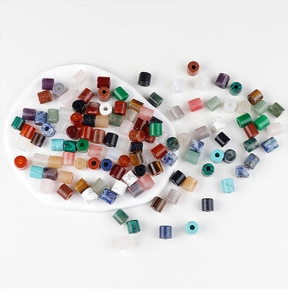 Detailed view of colorful natural stone cylinder beads for DIY jewelry making