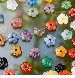 Macro detail of plum blossom stone beads for DIY jewelry with various natural colors