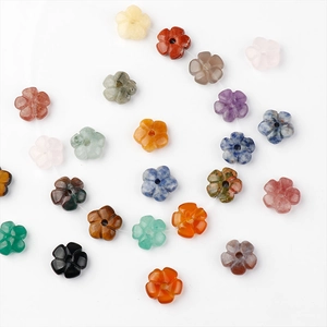 Macro view of 14mm flower-shaped natural stone beads for DIY jewelry making and crafts