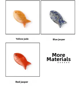 Detailed view of fish-shaped natural stone pendants in Yellow Jade, Blue Spot, and Red Jasper