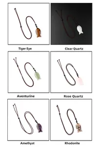 Macro display of fish shaped natural stone pendants in six colorful gemstone varieties