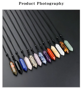 Detailed grid view of twelve hexagonal crystal point pendants on black cord necklaces