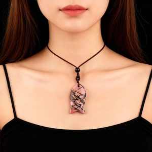 Fish-shaped natural gemstone necklace pendant with pink stone and woven cord