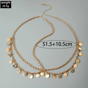 Detail showing the length and weight specs of the layered gold metal body chain