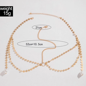 Detail view of gold layered headpiece with dimensions 52cm plus 10.5cm and pearl drops