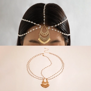 Detailed close-up of bohemian pearl head chain with crescent metal fringe and sequins