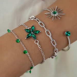 Détails du lot de bracelets argentés avec cristaux verts et pendentifs fleurs