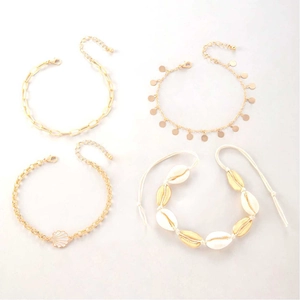 Bohemian 4-piece multilayer shell and gold chain anklet set for beach wear