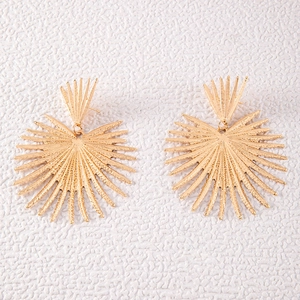 Chic gold-plated sunburst flower earrings with textured geometric heart-shaped aesthetic