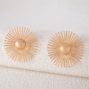 Detailed view of golden sunflower stud earrings with radiant metal texture and matte finish