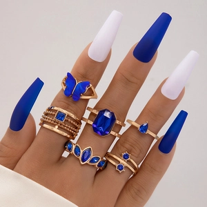 Ensemble de bagues dorées avec saphirs bleus, motifs papillon et cœur pour femmes