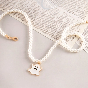 Faux pearl necklace with a white cartoon ghost pendant and gold-tone lobster clasp