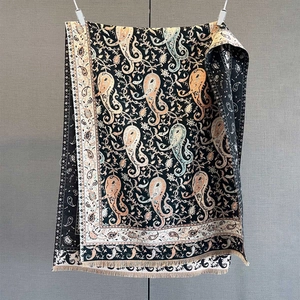 Detailed paisley pattern with fringes on a warm cashmere-feel pashmina shawl scarf