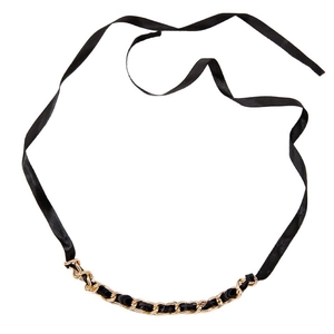 Retro black ribbon bow necklace with chunky gold metal chain on a white background