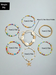 Detalle del set de 7 tobilleras bohemias con colgantes de estrella de mar y caracolas