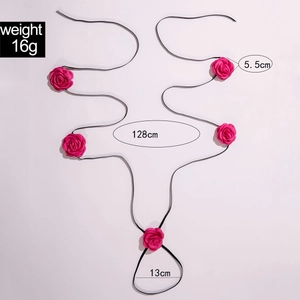 Detail view of long black cord necklace with five fuchsia satin roses and dimensions