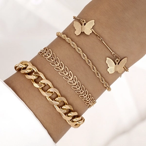 Chic 4-piece gold multilayer bracelet set with butterfly pendants and chunky Cuban chain