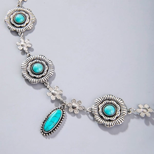 Collier bohème argenté avec maillons fleurs turquoise et pendentif ovale style ethnique