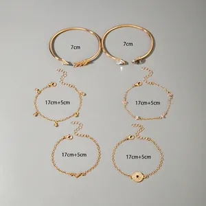 Detailed dimensions of gold bracelets featuring 7cm diameter and 17cm+5cm chain length