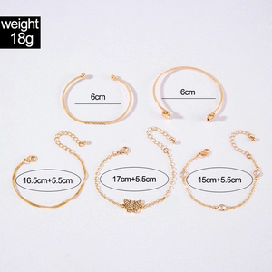 Detailed view of a 5-piece gold-toned bracelet set with dimensions and weight specs