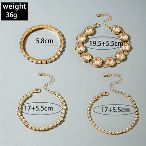 Detail view of 4-piece gold bracelet set with crystals and size specifications