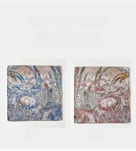 Detail of double-sided silk wool scarf featuring fantasy art prints in blue and burgundy