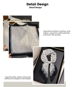 Detailed view of polka dot silk scarf featuring lace trim and elegant bow patterns