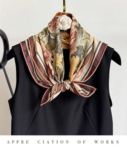 Detail of silk blend scarf with vintage floral peony pattern and burgundy striped border