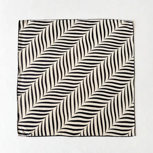 Silk blend square scarf featuring stylish black and white wave geometric patterns