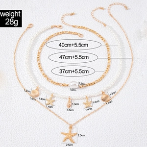 Detail showing weight 28g and dimensions of beaded multi-layered seashell necklace