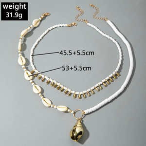 Detail view of double-layer beaded necklace with shells and starfish weighing 31.9g