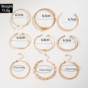 Detailed view of 9-piece gold bangle set with dimensions and weight specifications