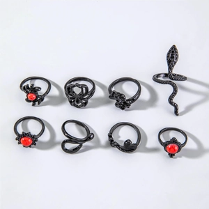8pcs Gothic Punk ring set featuring black spider, cobra, and skull designs with red gems