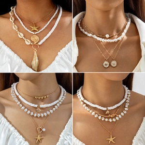Bohemian multilayer layered necklace with starfish shell charms and pearls