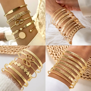 Chic gold-plated cuff bracelet set with geometric arrow patterns and boho charms