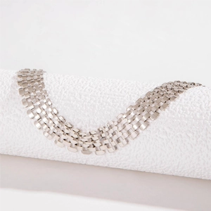 Detailed macro view of silver-tone punk thick link chain showing polished metal texture