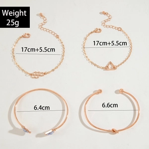 Set of four rose gold bracelets with geometric charms and turquoise marble textures