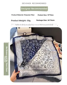 Detail of 70x70cm navy paisley polyester scarf with white bag and sunglasses