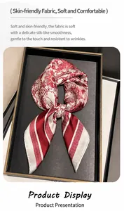 Detail view of a luxury silk-like scarf with red Toile de Jouy floral patterns and stripes