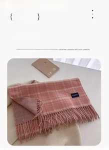 Close-up of pink and beige plaid scarf with soft fringe details, size 206x54cm